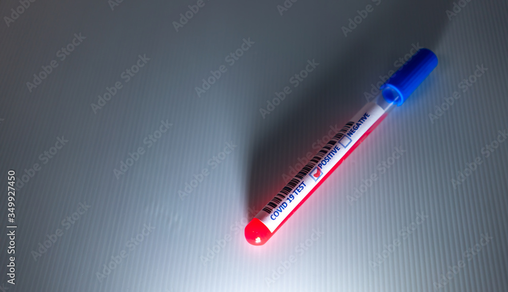 Blurry image of a Sample blood in test tube of Coronavirus (Covid-19). Coronavirus Covid 19 infected blood sample in a test tube Blurry image of a Sample blood in test tube of Coronavirus (Covid-19). Coronavirus Covid 19 infected blood sample in a test tube