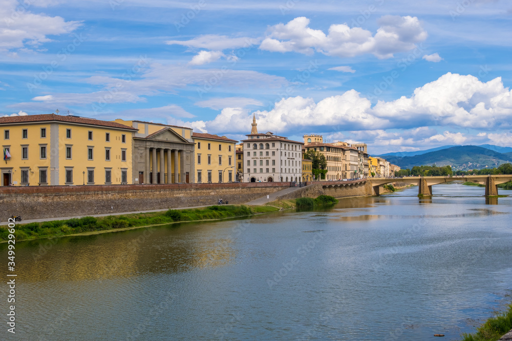 Ponte alle Grazie medieval bridge on Arno river in Florence. Tuscany, Italy