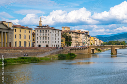 Ponte alle Grazie medieval bridge on Arno river in Florence. Tuscany, Italy