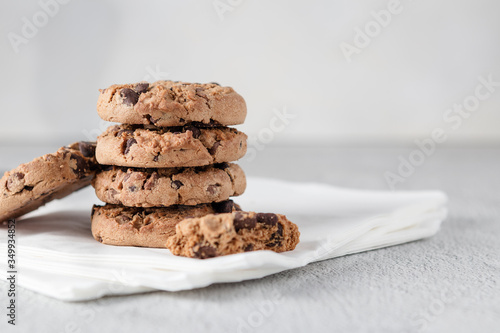 Pile of chocolate chip cookies on some napkins. Clean style