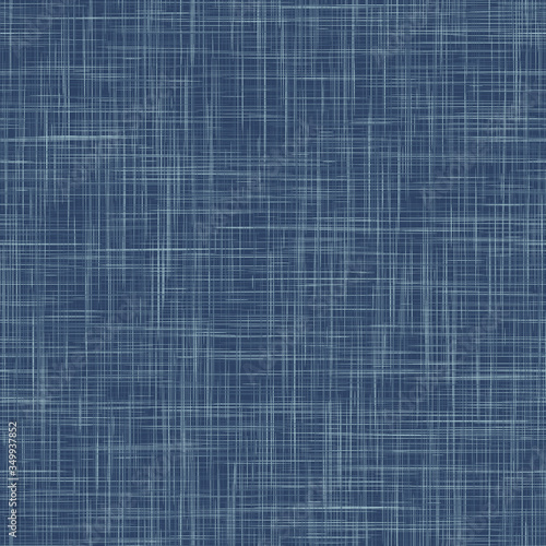 Seamless indigo blue woven linen texture pattern. Denim worn out weave style background. Decorative irregular acid wash japanese boro all over print. Fabric grunge canvas textile effect cloth swatch.