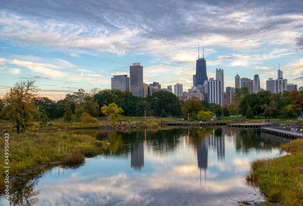Chicago skyline with reflection in lake in foreground shot from Lincoln Park Chicago skyline with reflection in lake in foreground shot from Lincoln Park