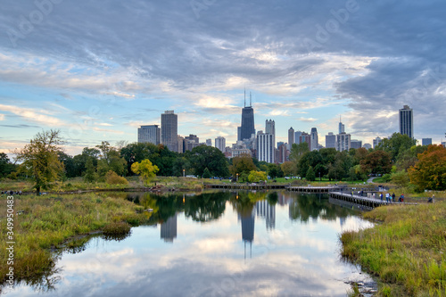  Chicago skyline with reflection in lake in foreground shot from Lincoln Park  © Daniel