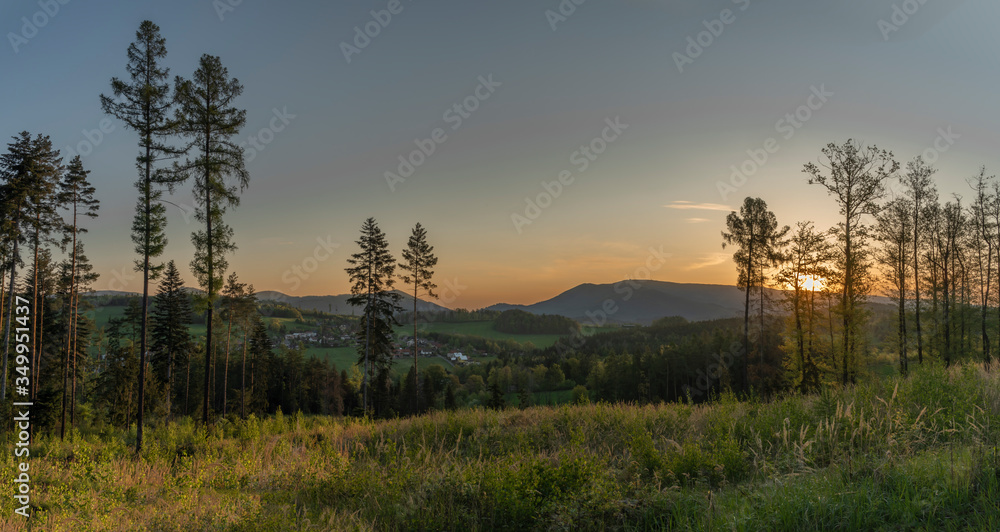 Sunrise near Vidce village in Beskydy mountains in spring sunrise morning