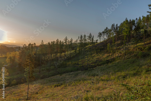 Sunrise near Vidce village in Beskydy mountains in spring sunrise morning photo