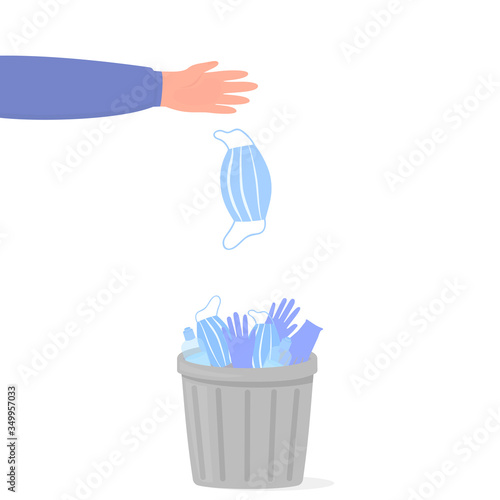 Coronavirus quarantine is over. Pandemic end. COVID-2019. A hand throws a medical surgical mask into a trash can with used surgical gloves and sanitizers