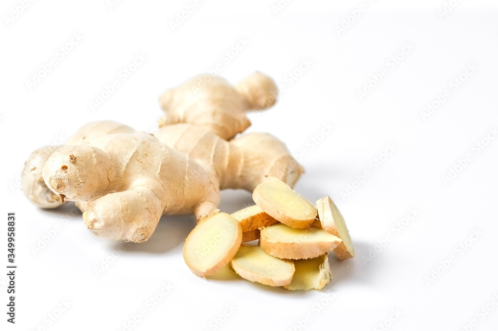 Ginger on a white background, selective focus. Ginger on a white background, selective focus.