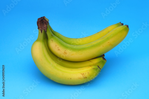 bananas organic fruits fresh food nutrition blue background