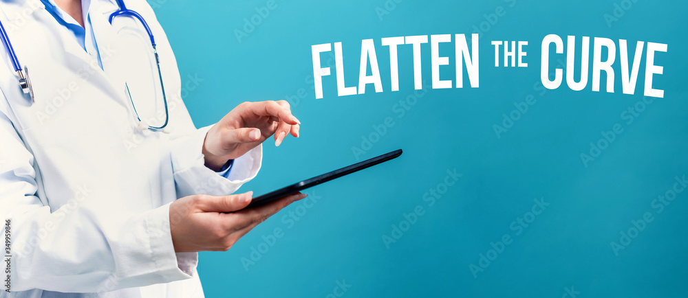 Flatten the Curve theme with a doctor using a tablet computer Flatten the Curve theme with a doctor using a tablet computer