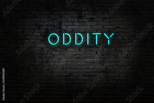Photography Neon sign with inscription oddity against brick wall