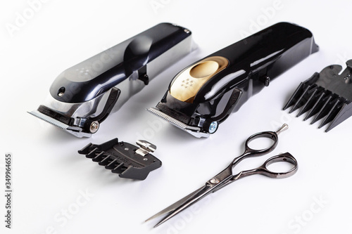 clipper trimmer and scissors on a white background
