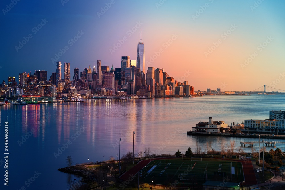 Naklejka premium New York City downtown skyline day and night
