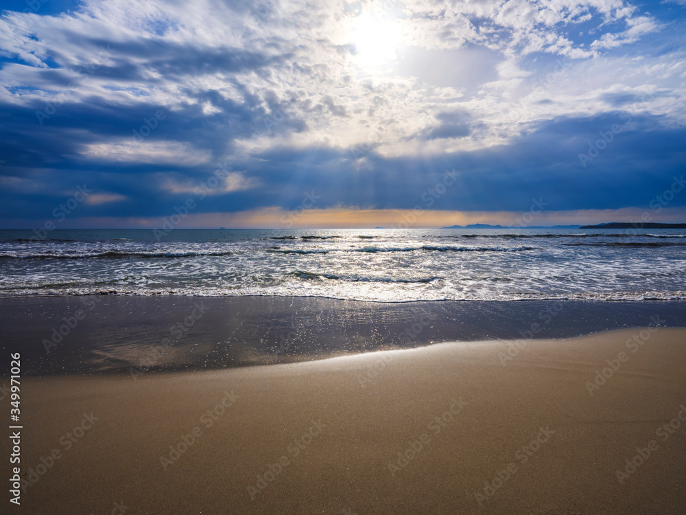 Beautiful Porto Pino wide sandy beach in sunset time, Porto Pino, Sardinia, Italy. Travel panorama background concept Beautiful Porto Pino wide sandy beach in sunset time, Porto Pino, Sardinia, Italy. Travel panorama background concept