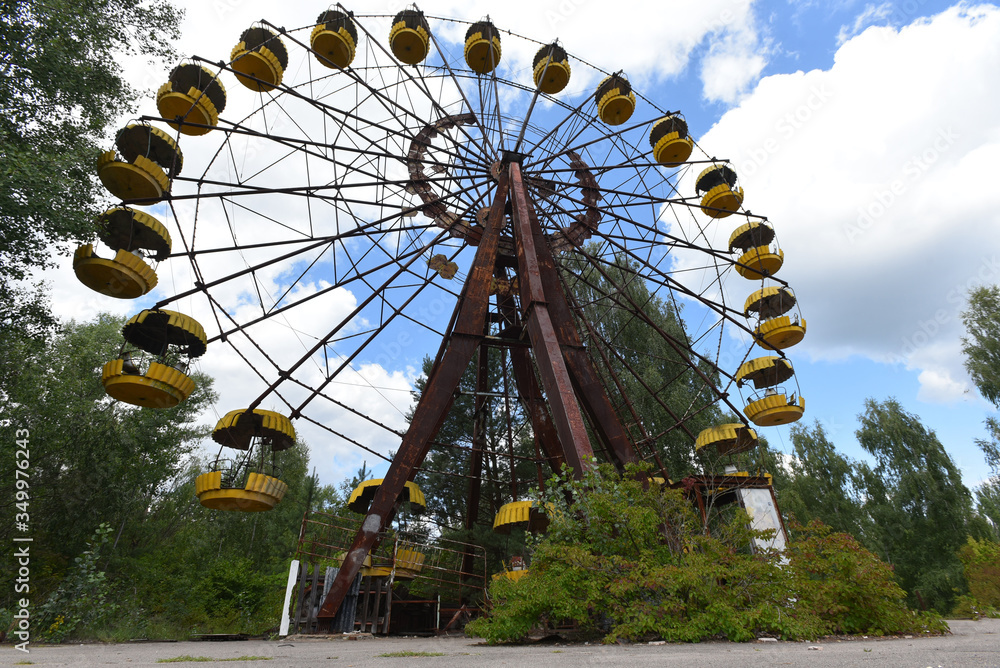 The Pripyat amusement park is an abandoned amusement park located in Pripyat, Ukraine at Chernobyl exlusion zone. Summer 2019. The Pripyat amusement park is an abandoned amusement park located in Pripyat, Ukraine at Chernobyl exlusion zone. Summer 2019.
