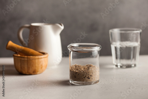  Sourdough for bread is active. Homemade rye grain flour sourdough. Starter leaven. Healthy eating concept. Copy space