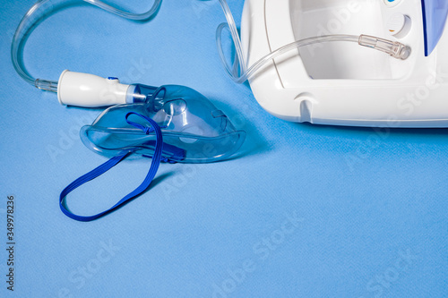 Photography Nebulizer medical appliance on a blue background