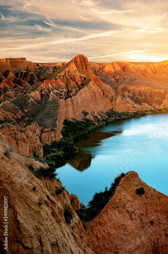  Lake between mountains at sunset