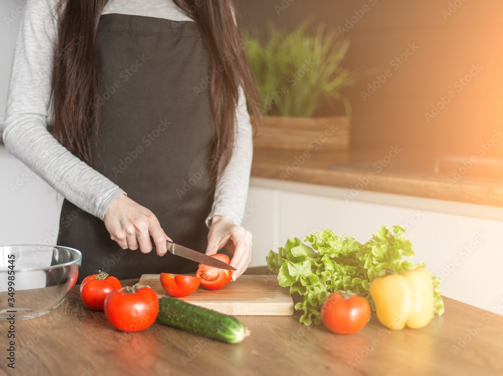 Young trendy woman cooking healthy food in the morning Young trendy woman cooking healthy food in the morning