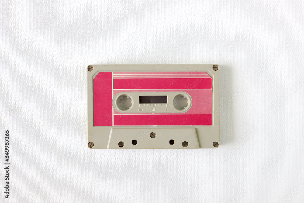 Old tape cassette, old or aged wood background. İsolated casette Old tape cassette, old or aged wood background. İsolated casette