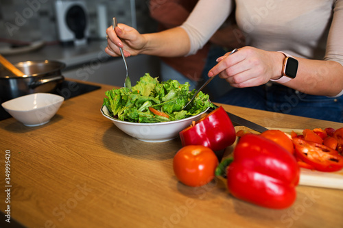 Preparing delicious salad for lunch