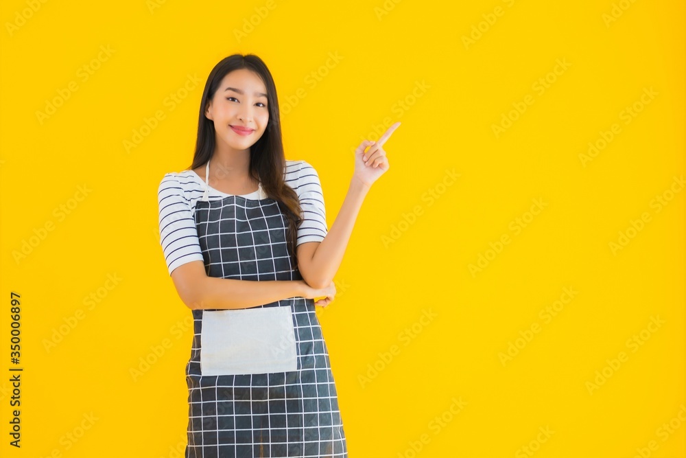 Portrait beautiful young asian woman wear apron with smile happy Portrait beautiful young asian woman wear apron with smile happy