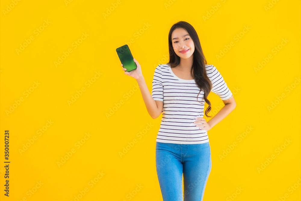 Portrait beautiful young asian woman smile happy use smart mobile phone Portrait beautiful young asian woman smile happy use smart mobile phone