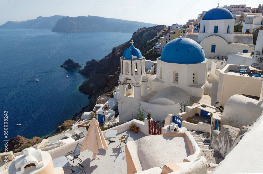 Blue dome church on the cliff of Oia, Santorini, Greece