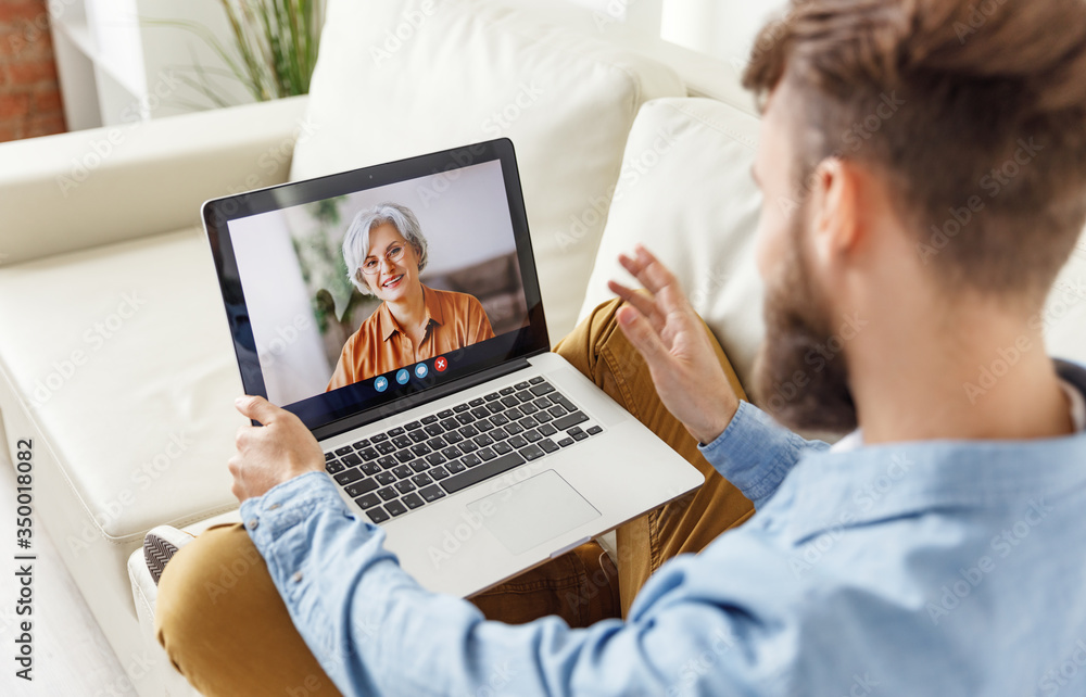 Man making video call to mother. Man making video call to mother.