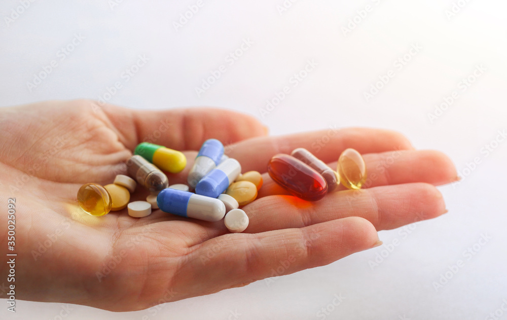 Insulated Hand with medical pills, medical concept Insulated Hand with medical pills, medical concept