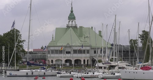 4K Helsinki Baltic Sea Finnish Bay lagoon, buildings and port construction cranes cloudy summer day video in Jatkasaari district in Finland capital, northern Europe photo