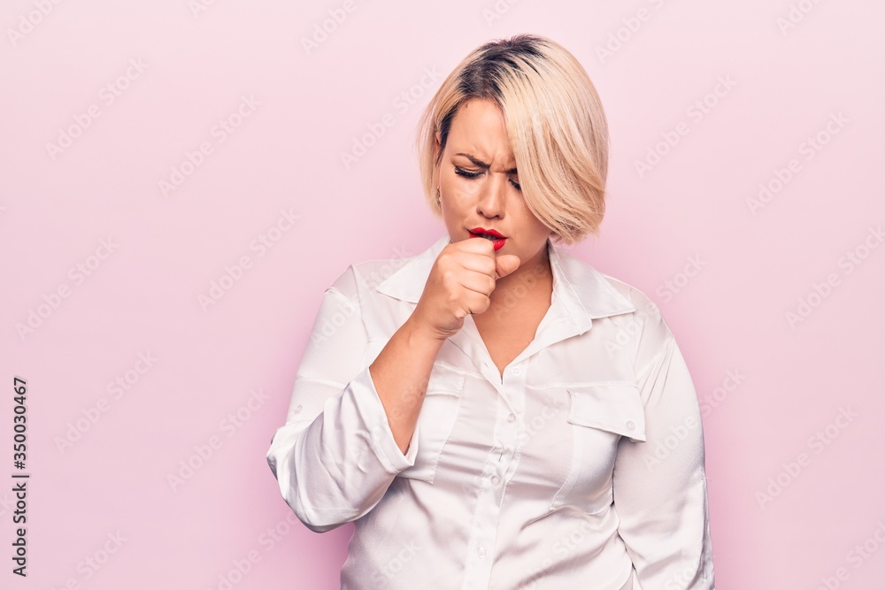 Young beautiful blonde plus size woman wearing elegant shirt over isolated pink background feeling unwell and coughing as symptom for cold or bronchitis. Health care concept. Young beautiful blonde plus size woman wearing elegant shirt over isolated pink background feeling unwell and coughing as symptom for cold or bronchitis. Health care concept.