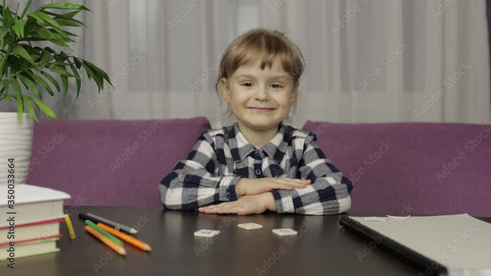 Children making video call doing distance education lessons at home. Webcam view Children making video call doing distance education lessons at home. Webcam view
