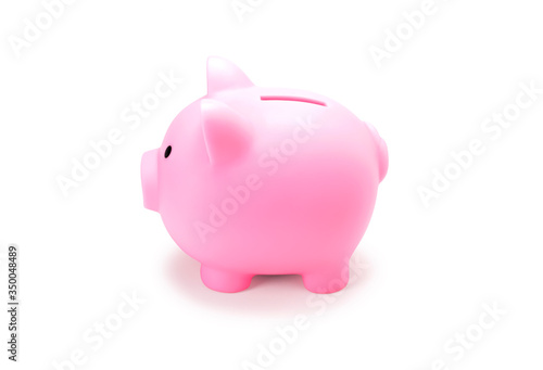 Pink piggy bank for save coin realistic photo image on white background. Side view of Pig doll for saving money isolate with clip path for di cut.