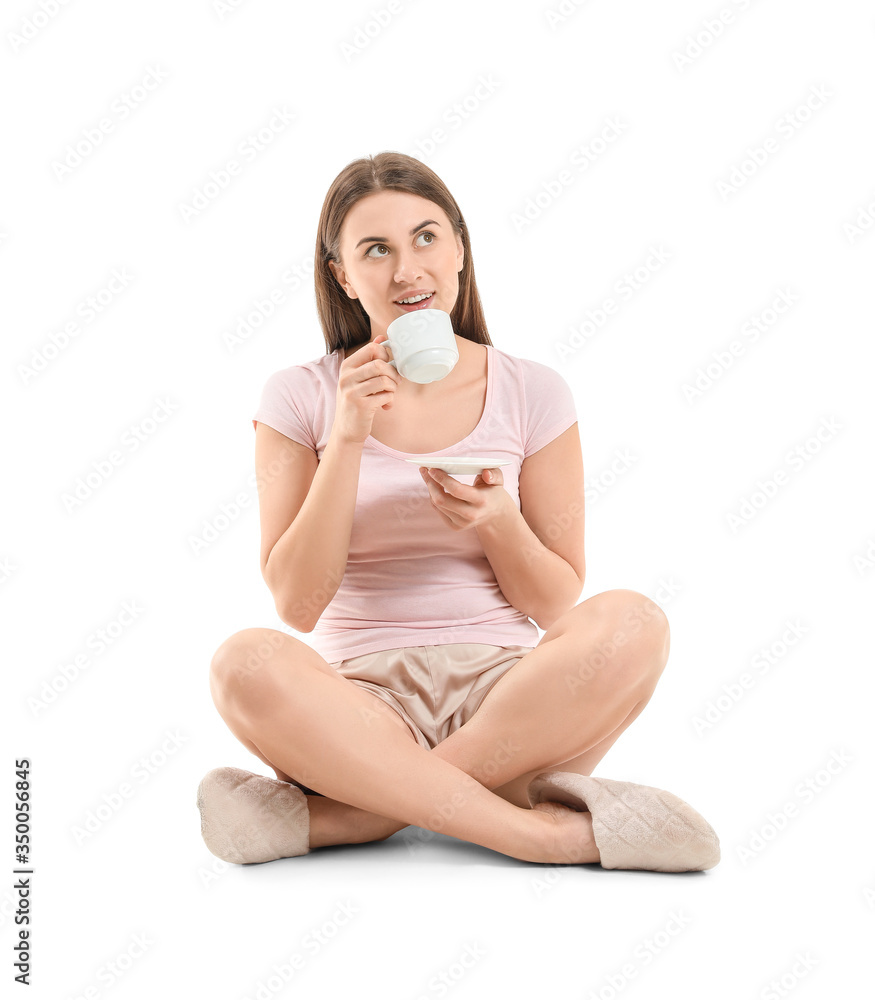 Young woman with cup of coffee on white background Young woman with cup of coffee on white background