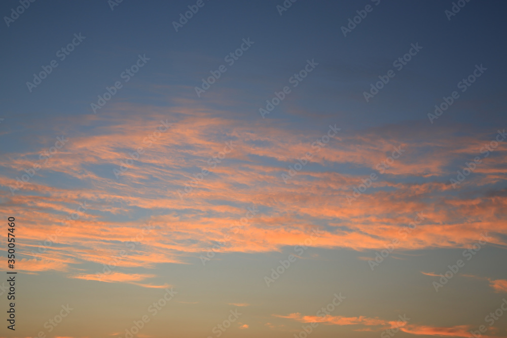 Abstract orange clouds at sunset sky background.
