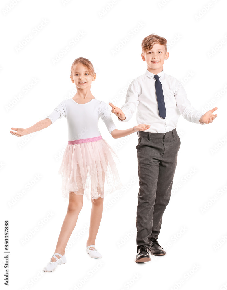 Naklejka premium Cute little children dancing against white background