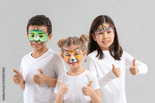 Funny children with face pa...