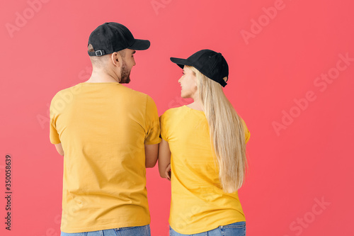 Young couple in stylish cap...