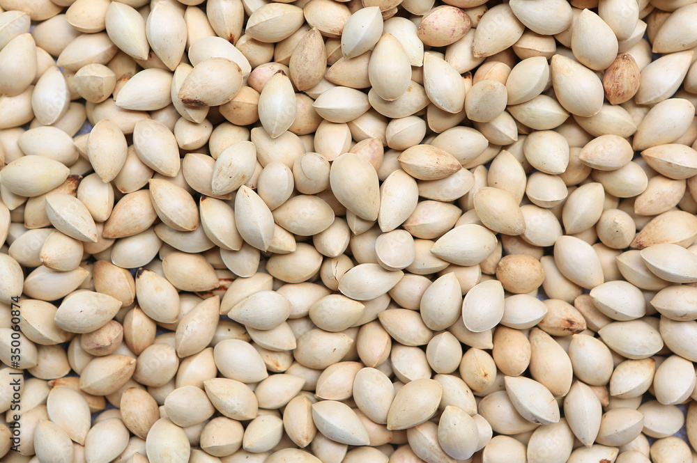 Pistachio nuts as texture background. Top view