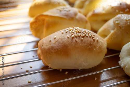 blur sesame buns on brown table background