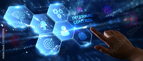 Businessman presses button internal control on virtual screens. Business, Technology, Internet and network concept. photo