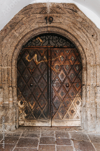 Old fashioned wooden door in Innsbruck, Austria