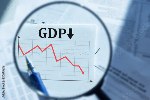 Fall in GDP. A person looks...
