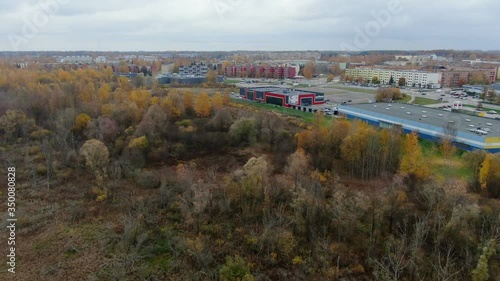 forest next to annelinn, city is growing photo