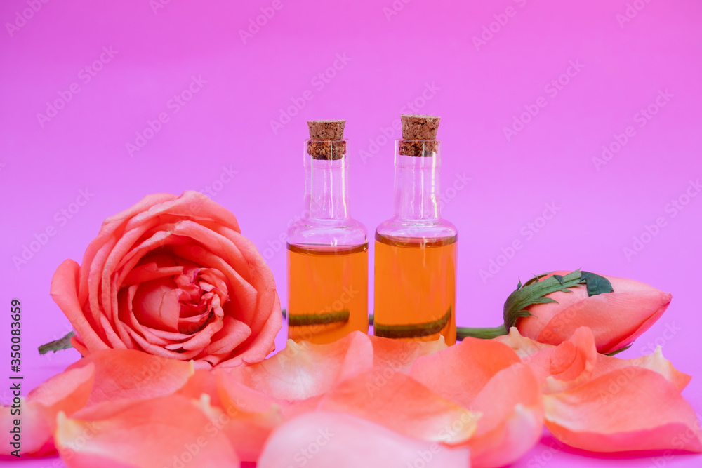 Essential oil in bottles extracted from rose Essential oil in bottles extracted from rose