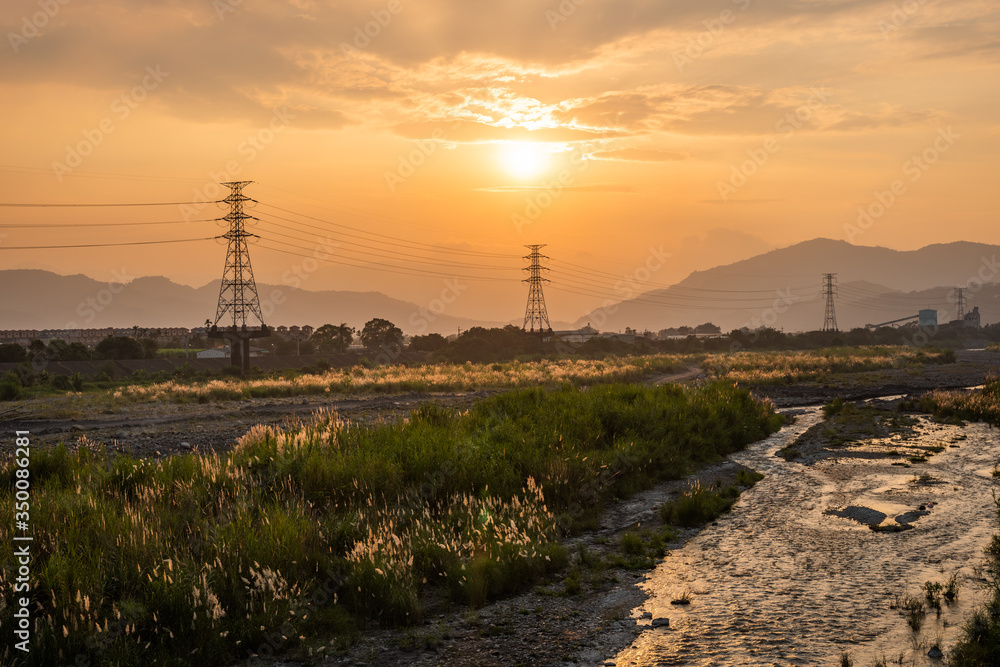 urban sunset scenery with electronic tower urban sunset scenery with electronic tower