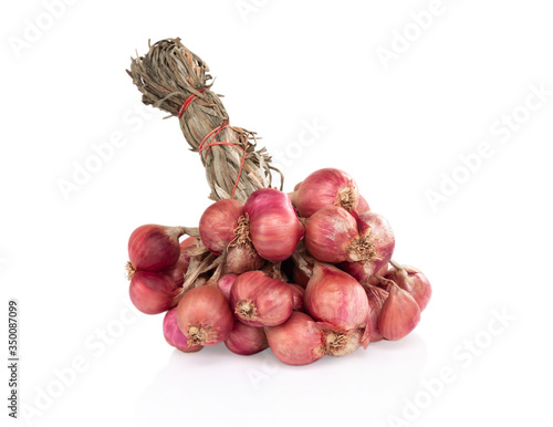 Red dried onions on white background, raw food ingredient