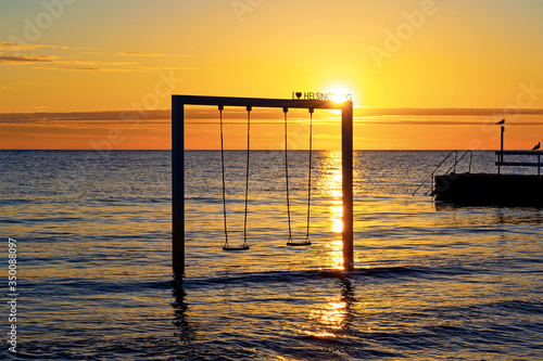 Beach swing with stunning sunset views in Skane, southern Sweden