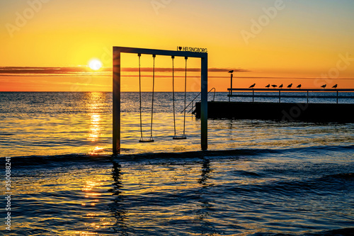 Beach swing with stunning sunset views in Skane, southern Sweden