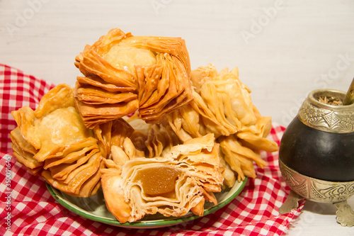 Fototapeta Naklejka Na Ścianę i Meble -  fried pastry with quince and batata typical of south america gastronomy